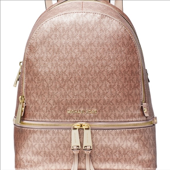 Michael Kors Handbags - 🎒Michael Kors Metallic Rhea Backpack 🎒